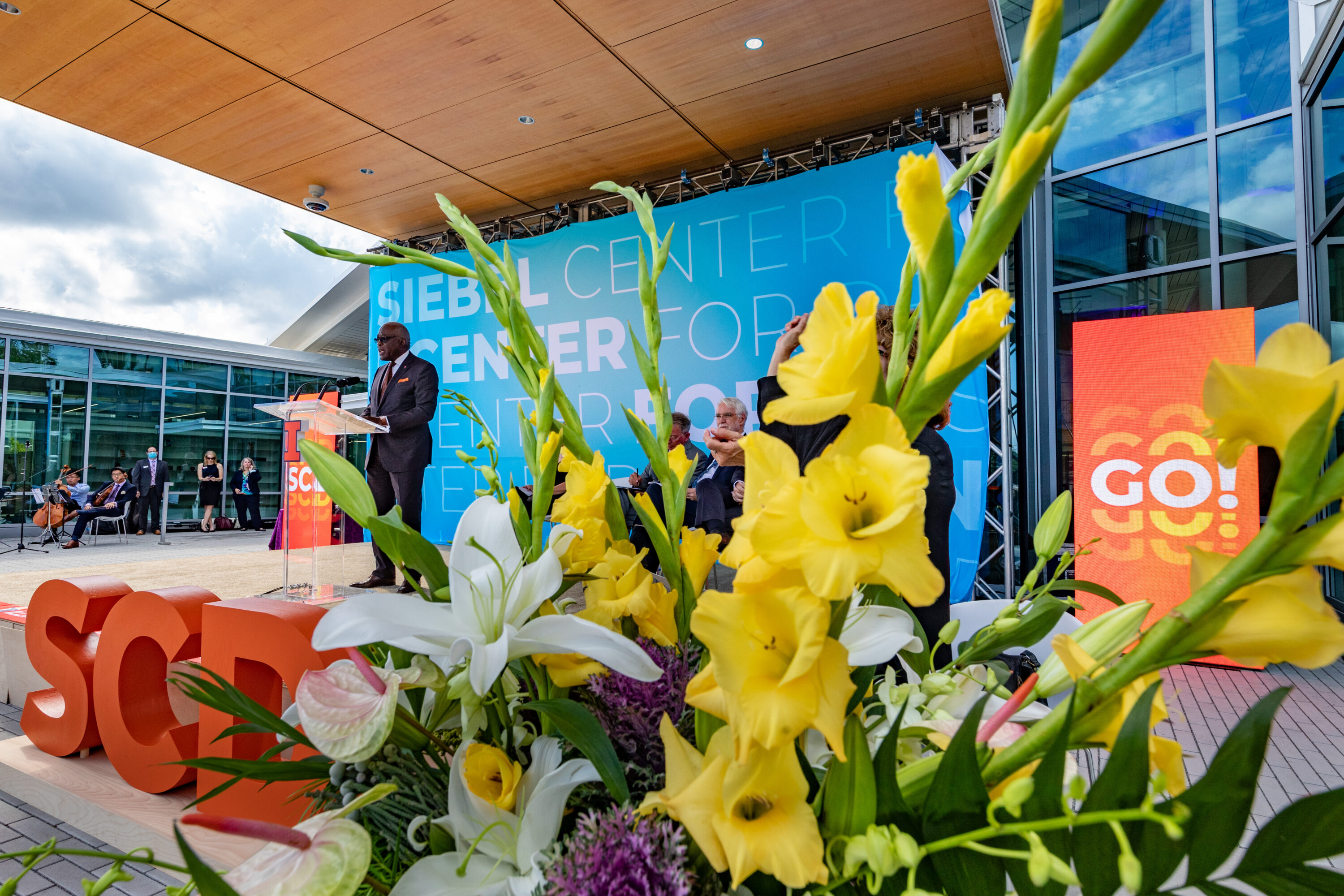 Guest of honor Tom Siebel joins dignitaries during building dedication ceremonies for the Siebel Center for Design.
Remarks were given by Siebel Center for Design’s director, Rachel Switzky, plus University of Illinois System President Timothy Killeen, UIUC Chancellor Robert Jones, and UIUC Provost Andreas Cangellaris. Tom Siebel delivered keynote remarks.
Following the ceremony, guests toured the center during open house festivities.
Thomas M. Siebel is the founder of C3 AI and has served as the chairman of the board of directors since January 2009 and as chief executive officer since July 2011. Prior to founding the company, Siebel founded and served as the chief executive officer of Siebel Systems, a global CRM software company, from 1993 until it merged with Oracle Corporation in January 2006. Siebel served in various leadership positions with Oracle Corporation from January 1984 to September 1990. Siebel serves as a member of the boards of advisors for the colleges of engineering at the University of Illinois Urbana-Champaign and the University of California, Berkeley.